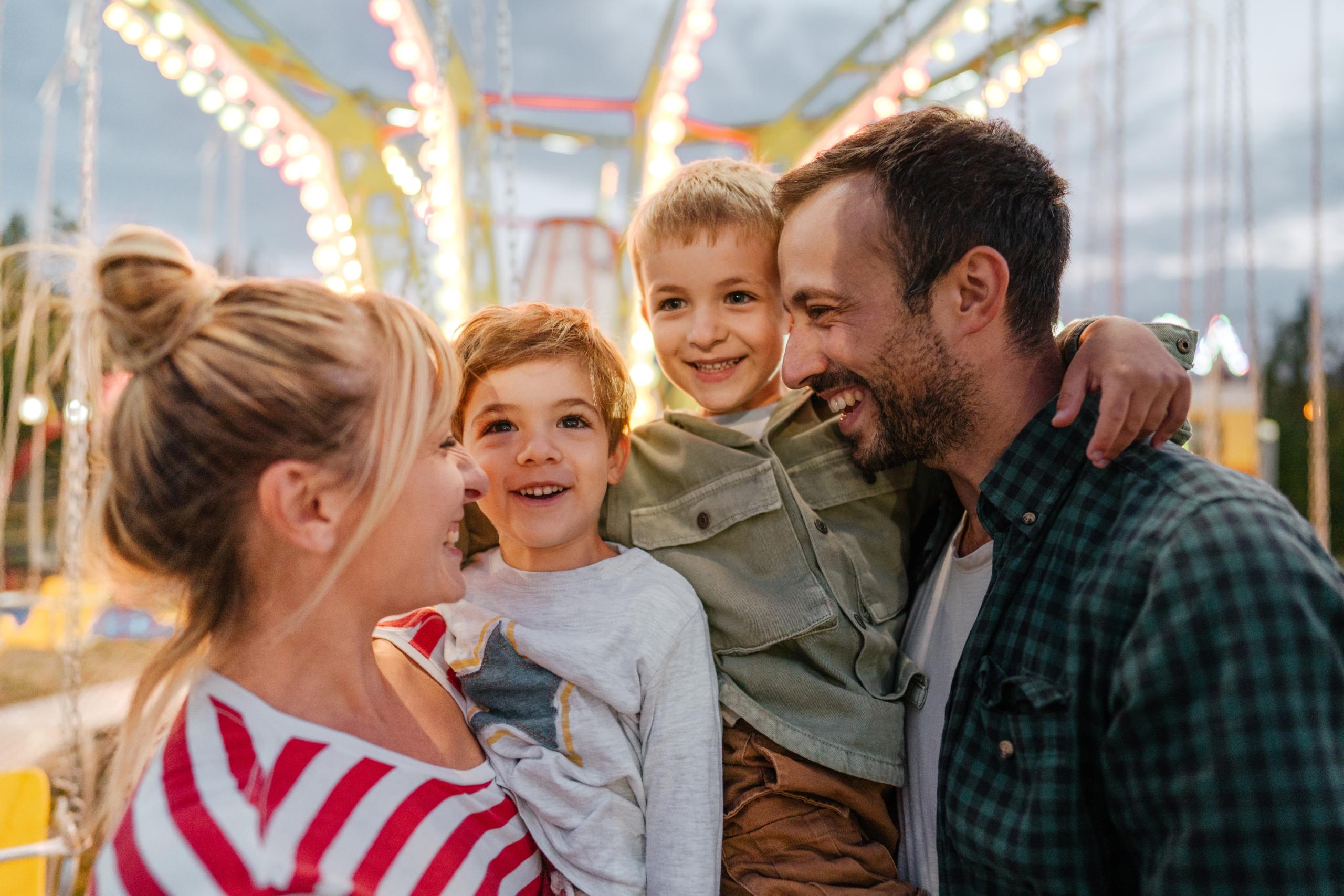 Family riding a carousel